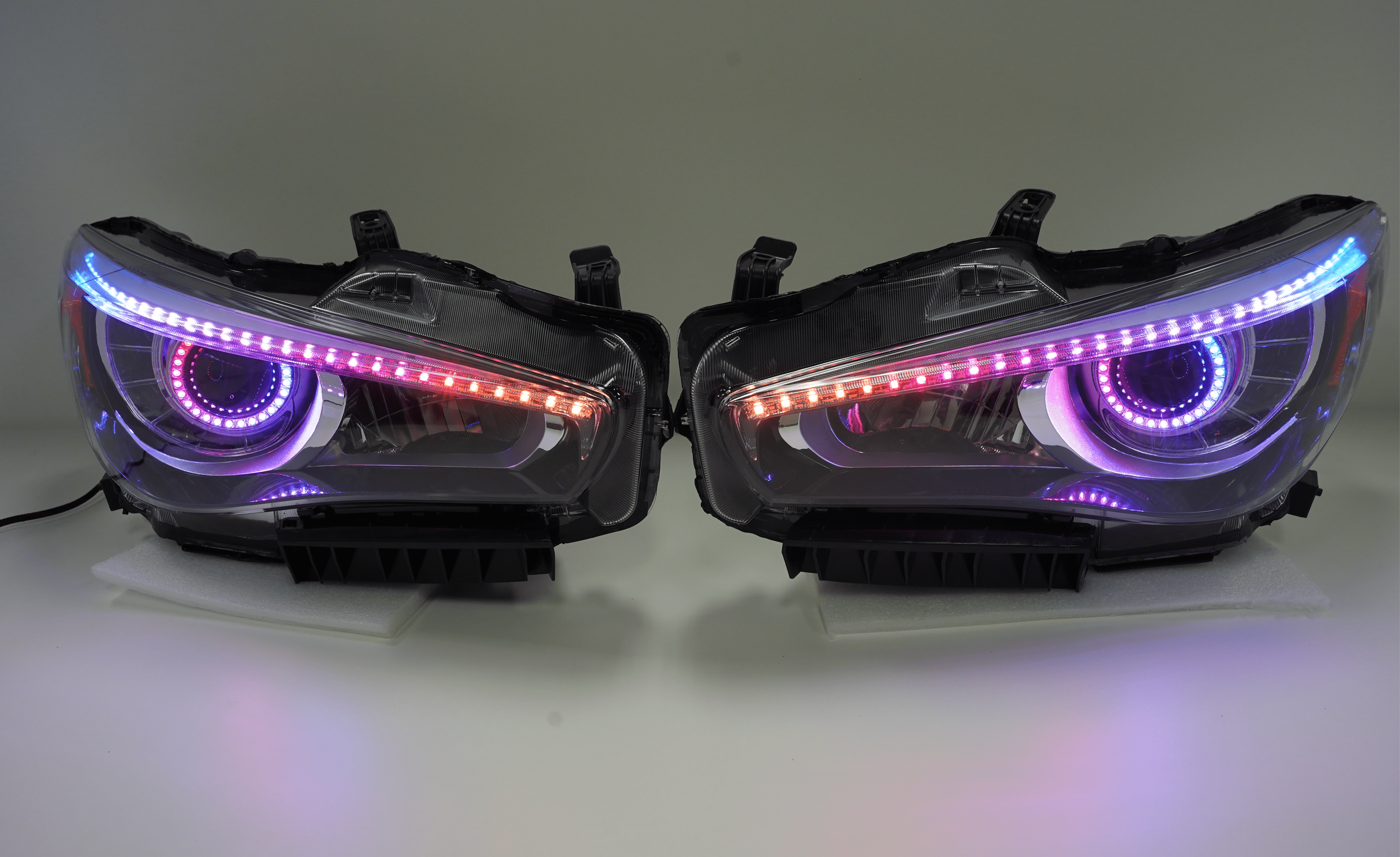 2014-2022 Infiniti Q50 Prebuilt Headlights - RGB Halo Kits Multicolor Flow Series Color Chasing RGBWA LED headlight kit Oracle Lighting Trendz OneUpLighting Morimoto theretrofitsource AutoLEDTech Diode Dynamics